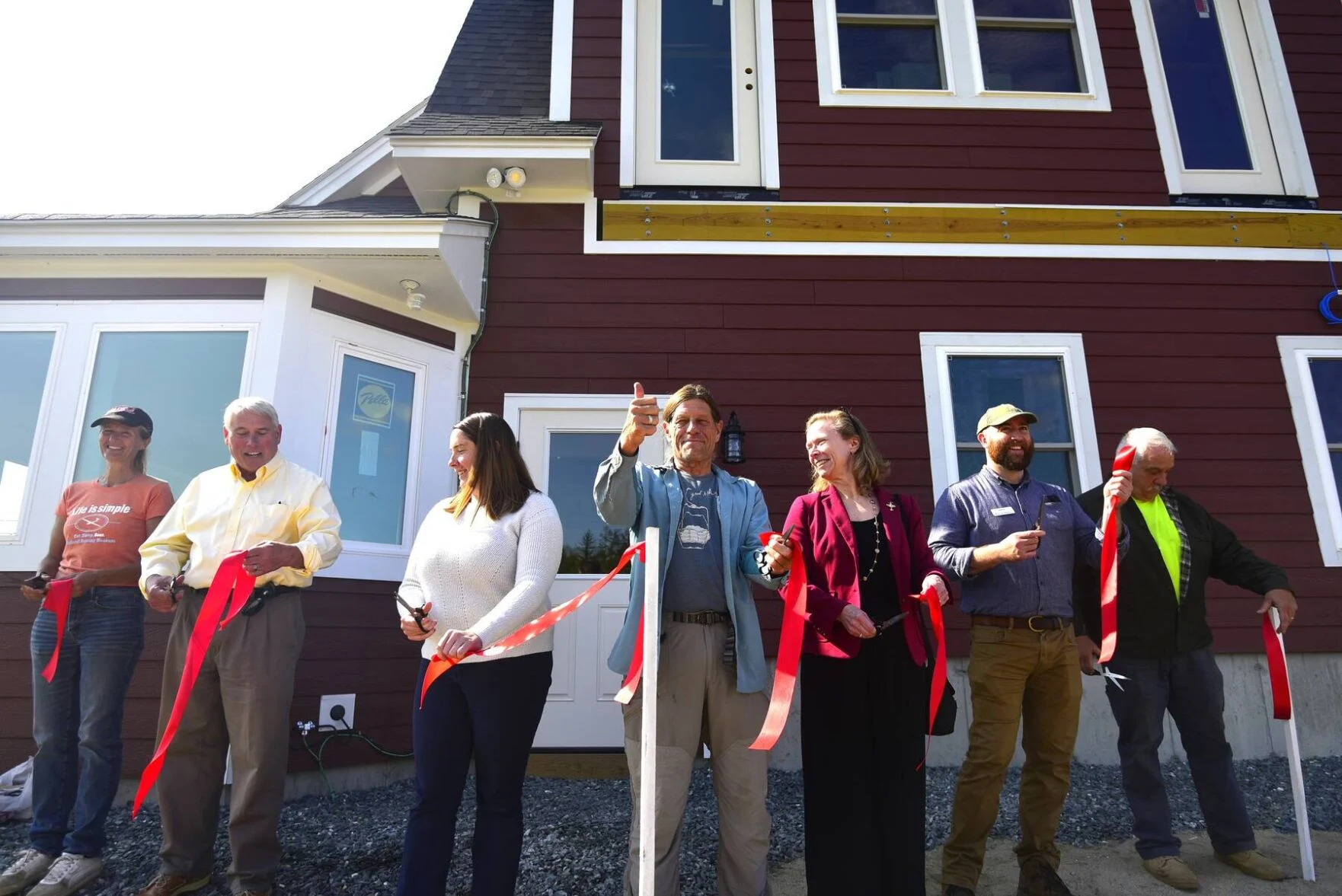 Community members gathered for a ribbon-cutting ceremony